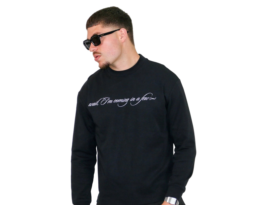 WAIT! Wait Long Sleeve black heavyweight long sleeve tee, streetwear outfit worn by model (1)